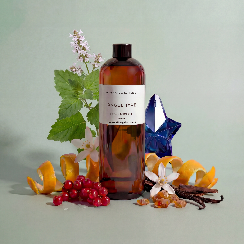 Bottle of 'Angel Type' fragrance oil with flowers, fruits, and a crystal on a light green background
