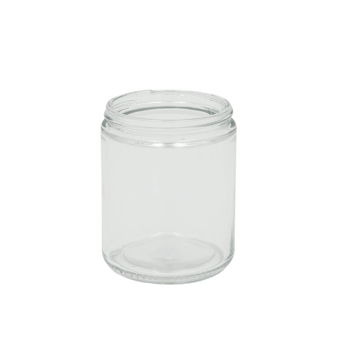 small clear apothecary style candle jar