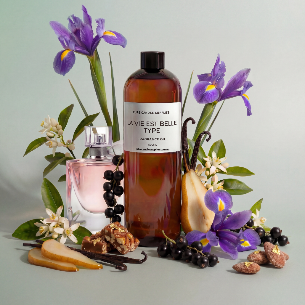 Perfume bottle with flowers and vanilla beans on a light gray background