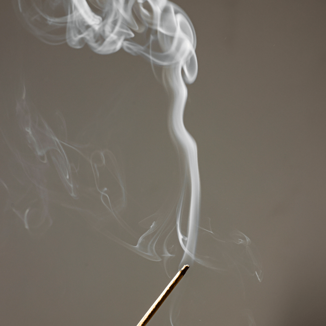 insence stick with smoke coming out