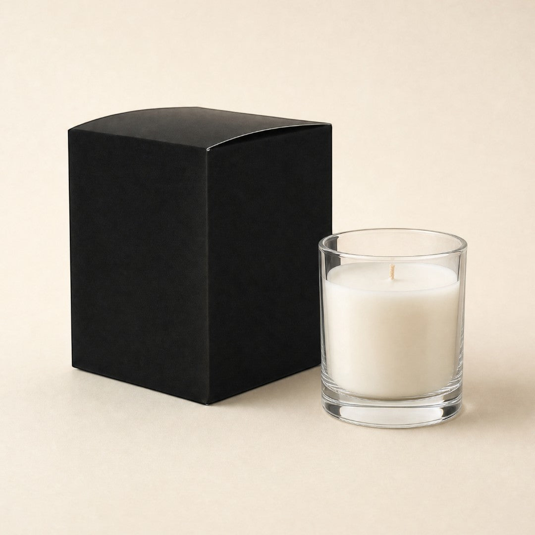 Pure Candle Supplies Melbourne large black candle jar packaging box next to a clear glass candle with white wax