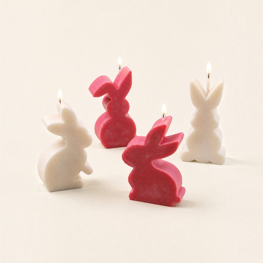 Pure Candle Supplies Melbourne bunny shaped candles in red and cream wax, featuring four distinct rabbit silhouettes.