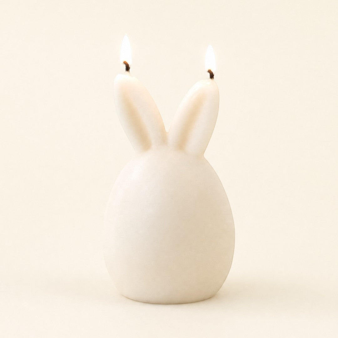 Pure Candle Supplies Melbourne bunny egg candle with lit ears against a light background for Easter decor