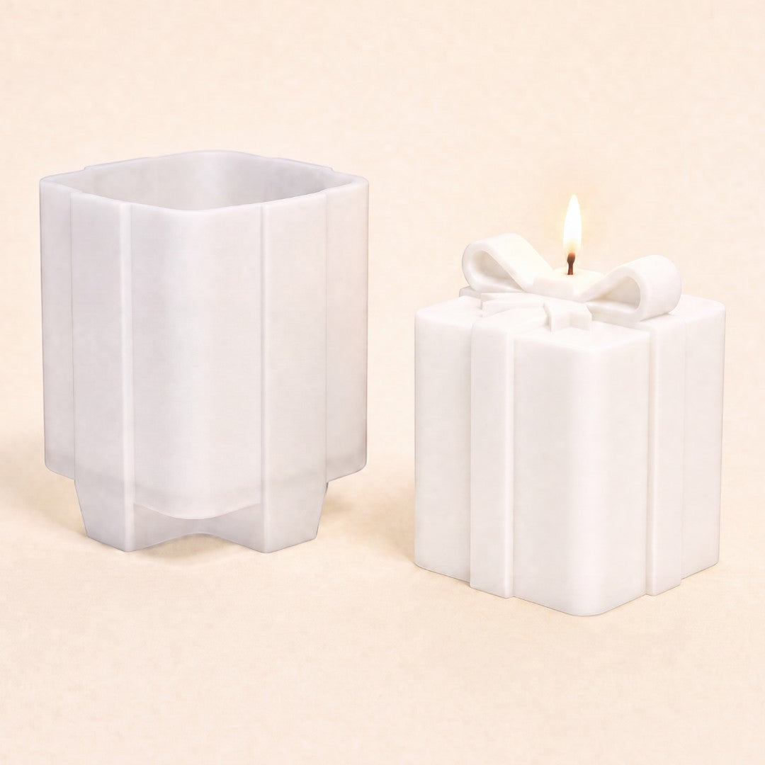 Pure Candle Supplies Melbourne Christmas present silicone candle mould next to a finished gift-shaped white candle
