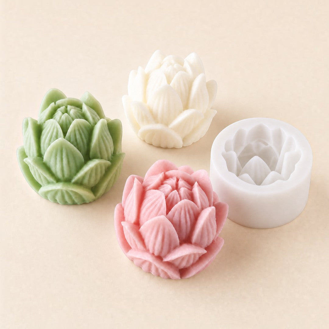 Pure Candle Supplies Melbourne silicone lotus flower candle mould with finished green, white, and pink floral candles.