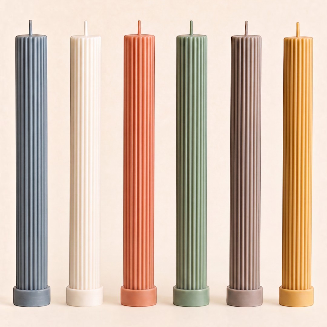 Pure Candle Supplies Melbourne ribbed column pillar candles in various muted colours standing in a row