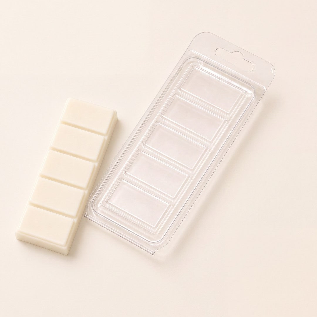 Pure Candle Supplies Melbourne 5 cavity plastic snap bar clamshell mould next to a white wax melt bar