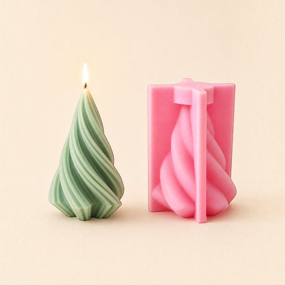 Pure Candle Supplies Melbourne spiral Christmas tree silicone candle mould next to a lit green spiral tree candle