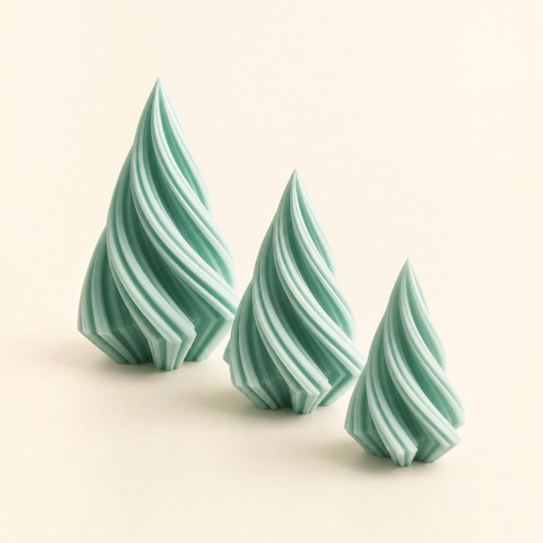 Pure Candle Supplies Melbourne spiral Christmas tree silicone candle moulds in small, medium, and large sizes.