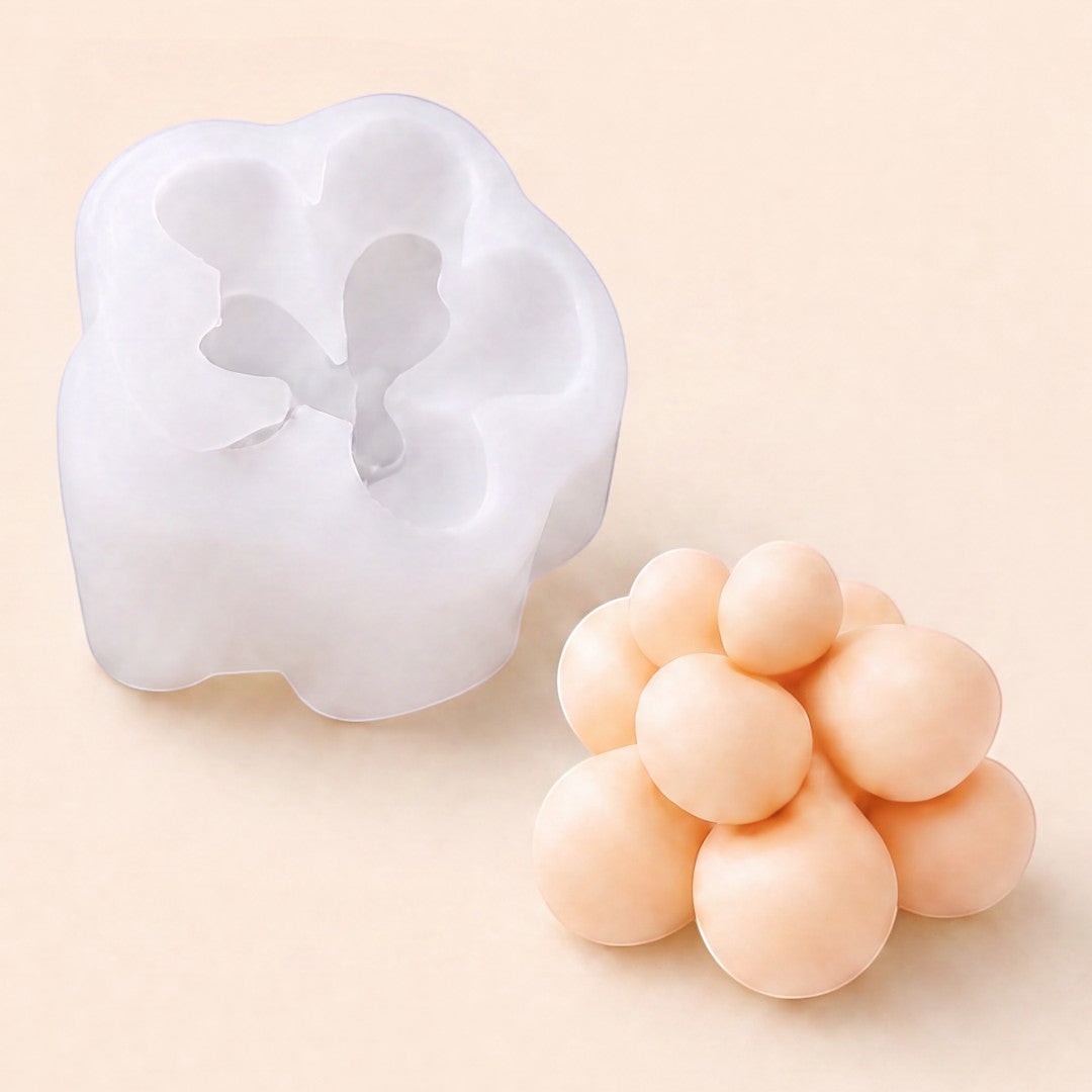 Pure Candle Supplies Melbourne flexible silicone succulent candle mould with a finished peach-coloured round succulent candle