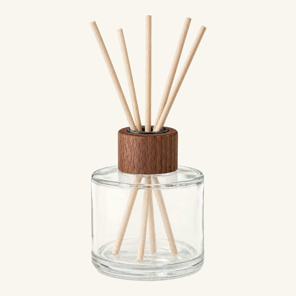 Pure Candle Supplies Melbourne walnut wood diffuser cap on a clear glass vessel with natural reed sticks