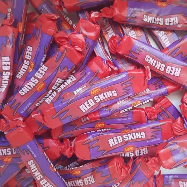 Pile of red skins lollies