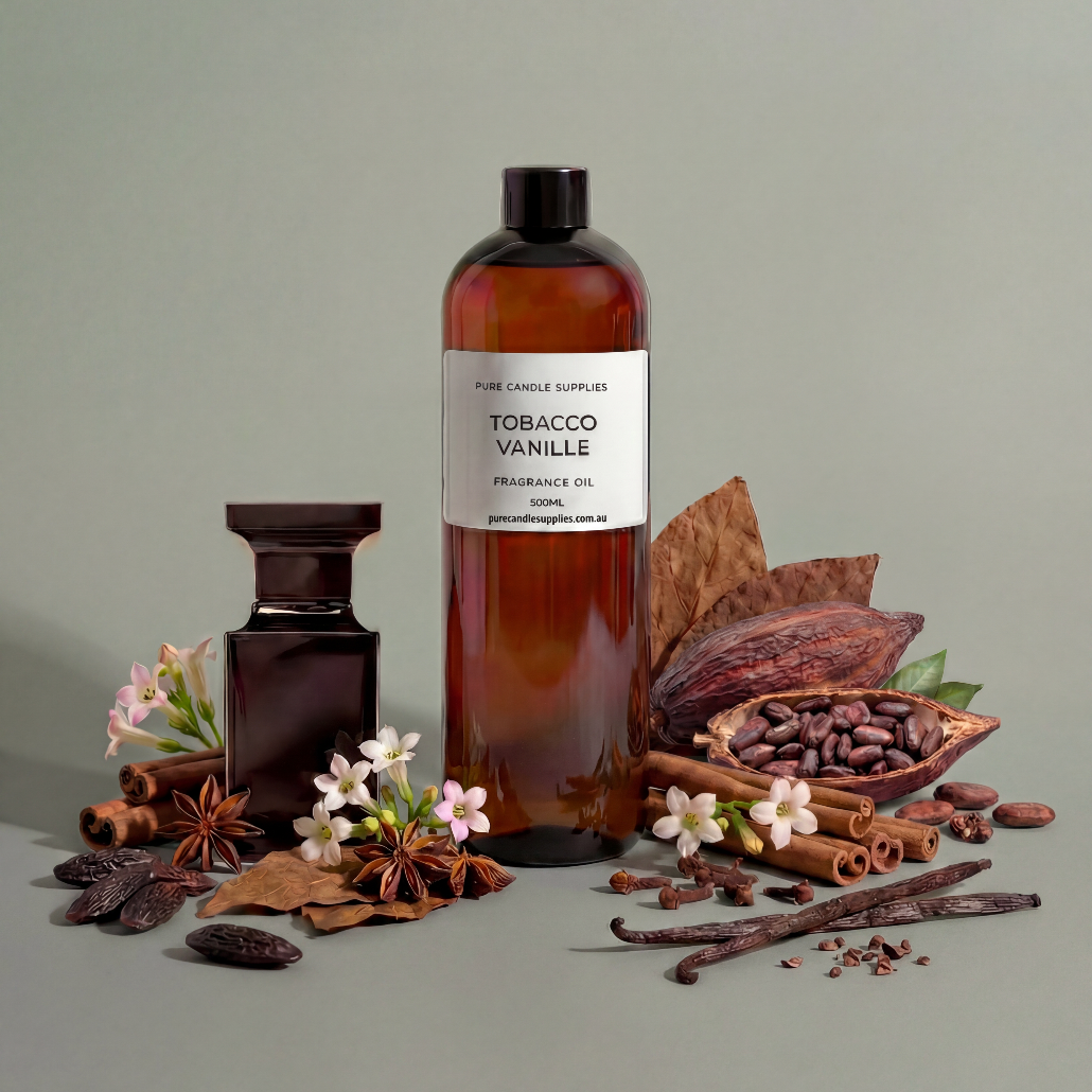 Bottle of Tobacco Vanille fragrance oil with vanilla beans, cinnamon sticks, and flowers on a gray background