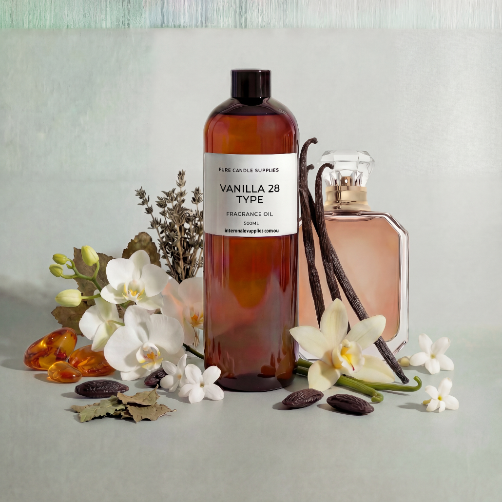Bottle of Vanilla 28 Type fragrance oil with vanilla beans and flowers on a light background