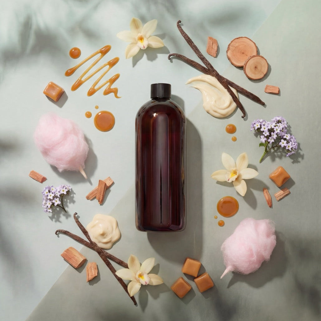 Brown bottle surrounded by flowers, candies, and vanilla beans on a light gray background