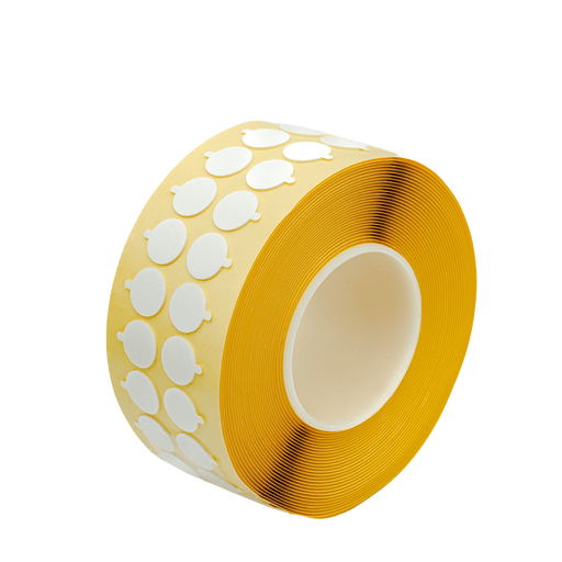 roll of wick sticker tabs on yellow backing