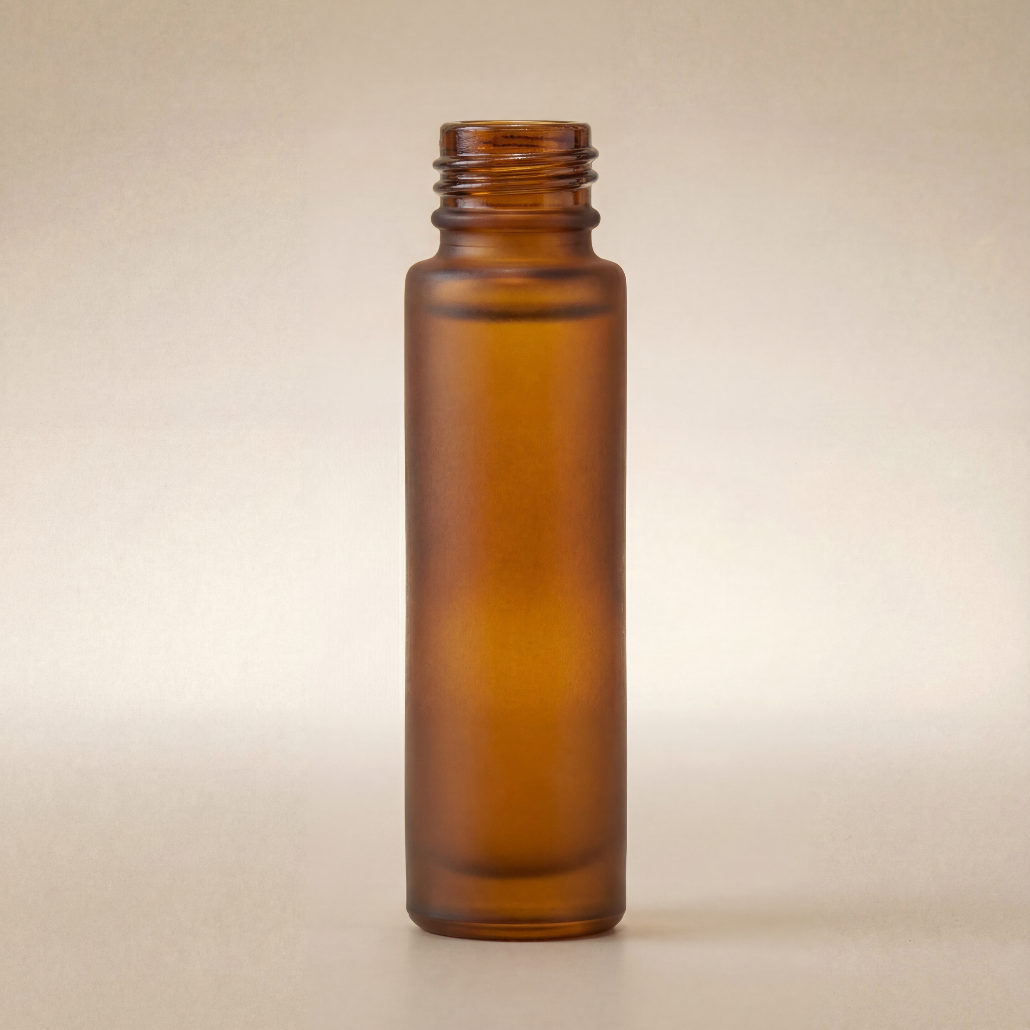 Amber glass bottle on a beige background