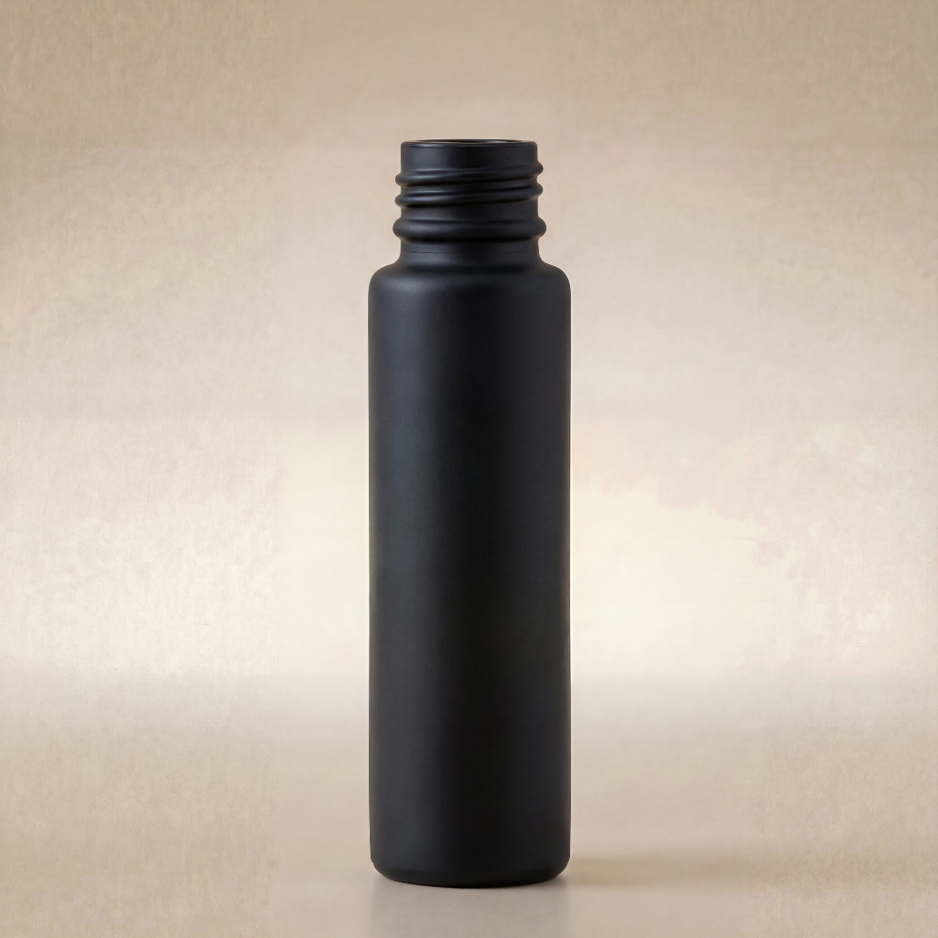 Black bottle on a beige background
