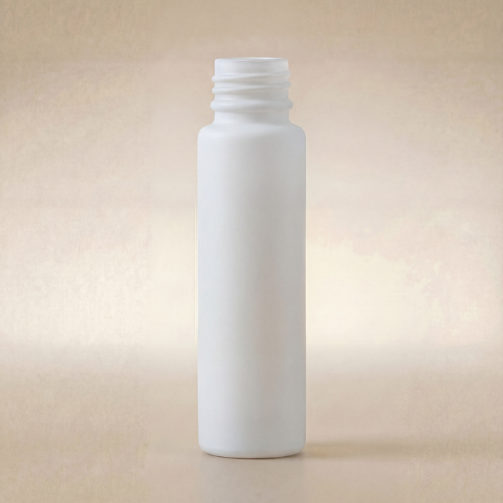 White cylindrical bottle on a beige background