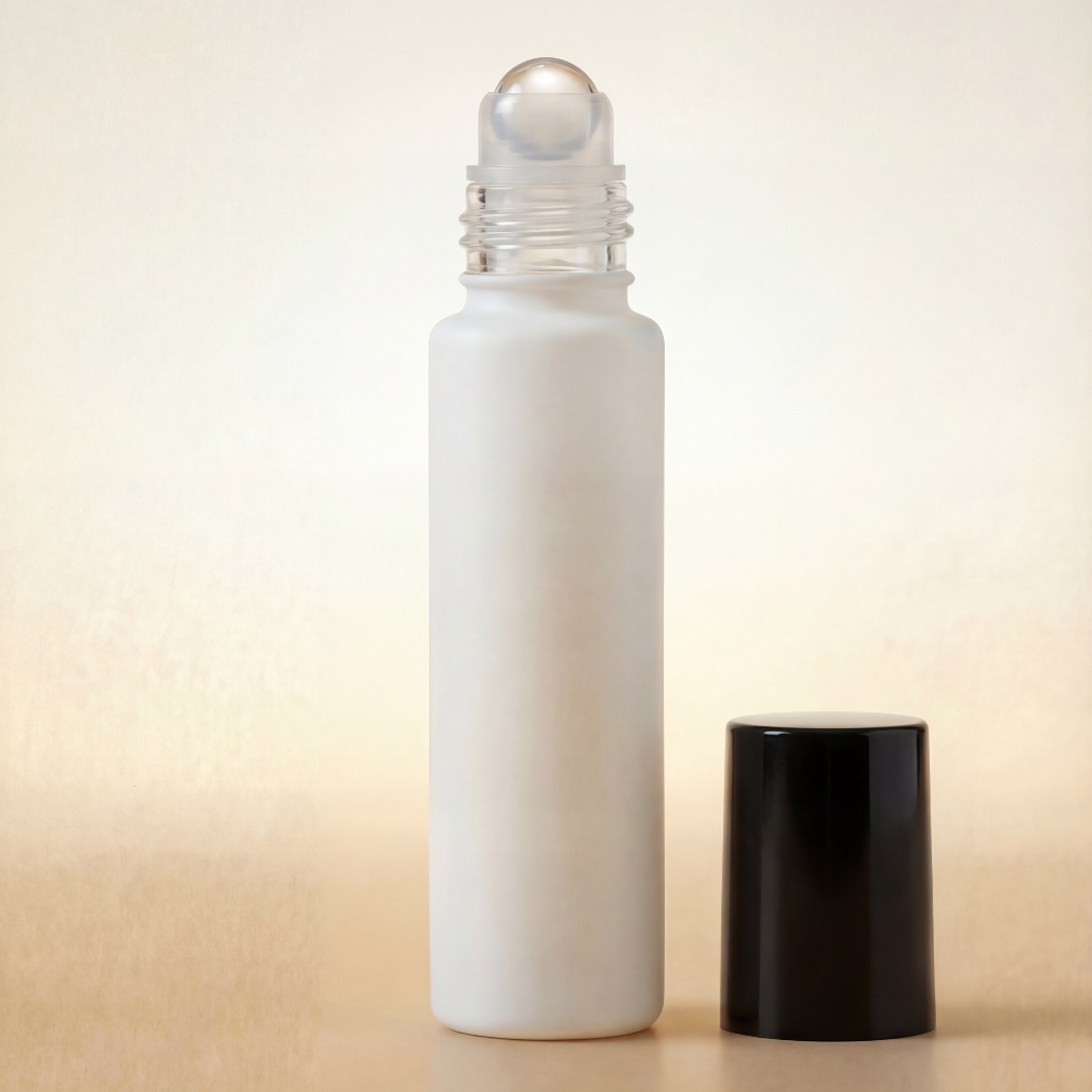 White roller bottle with a black cap on a beige background