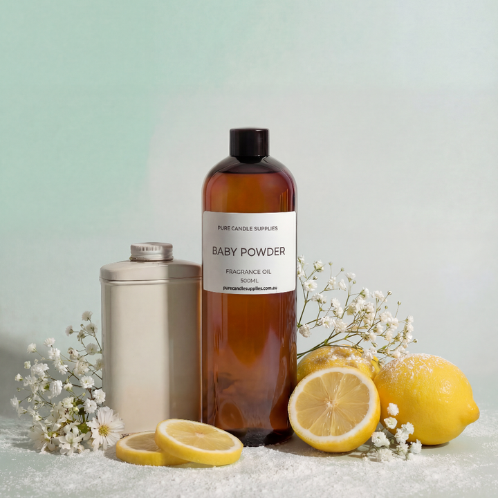 Baby powder fragrance oil bottle with lemons and a container on a light background