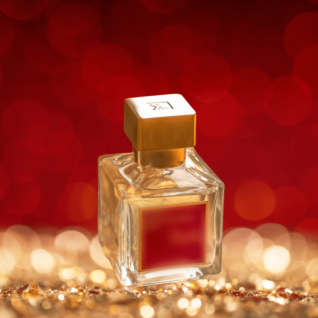 perfume bottle in centre of gold and red glitzy background