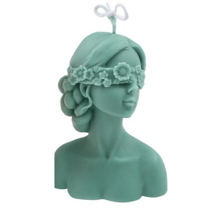 green blindfolded female torso candle mould on white background