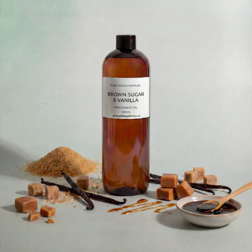 Brown bottle of 'Brown Sugar & Vanilla' fragrance oil with ingredients on a light gray background