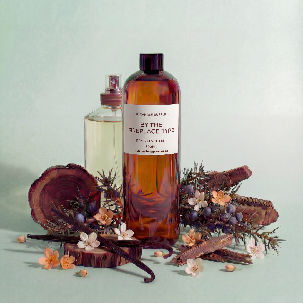 Two bottles of 'By the Fireplace Type' fragrance oil with decorative elements on a light green background