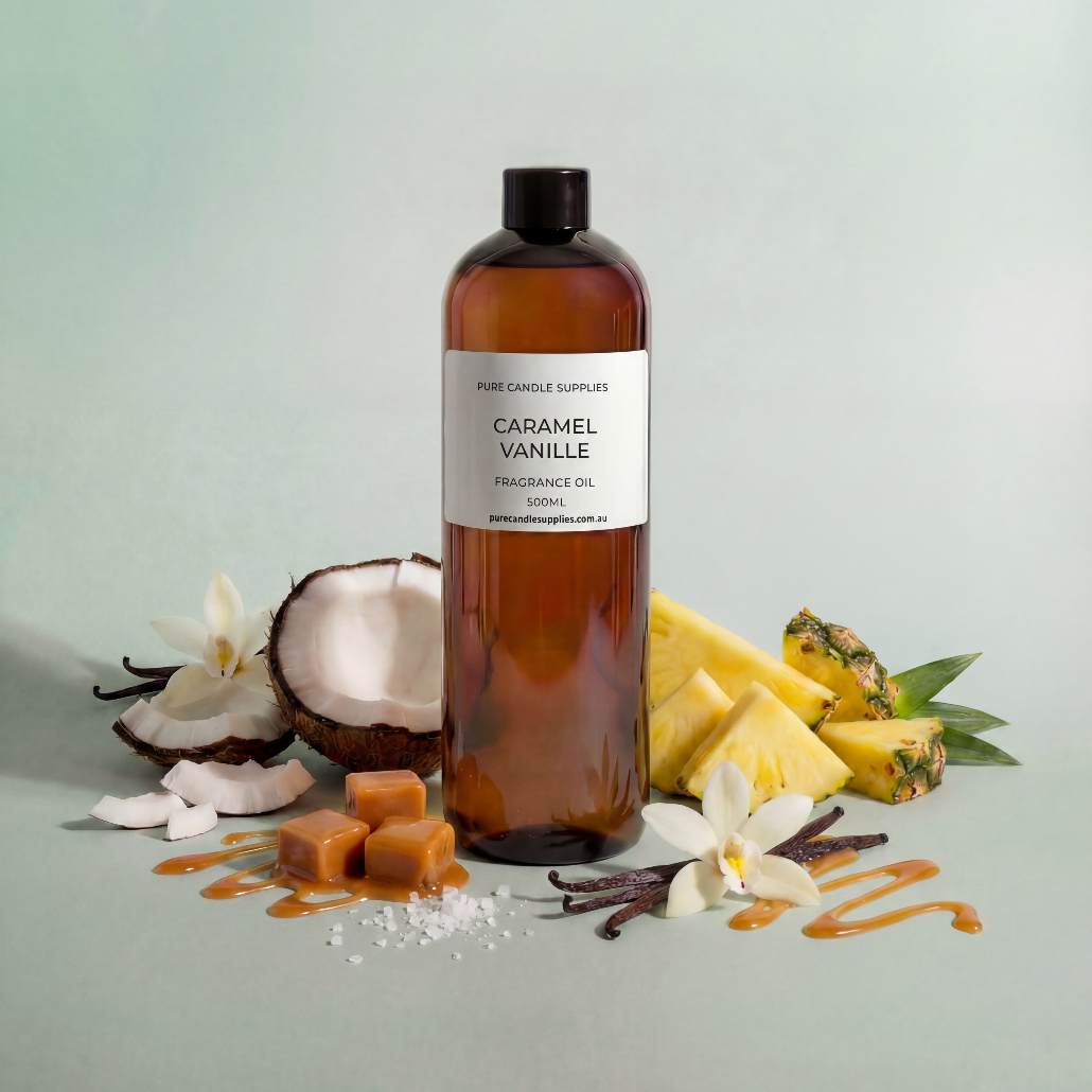 Bottle of Caramel Vanille fragrance oil with vanilla bean, pineapple, and coconut on a light green background
