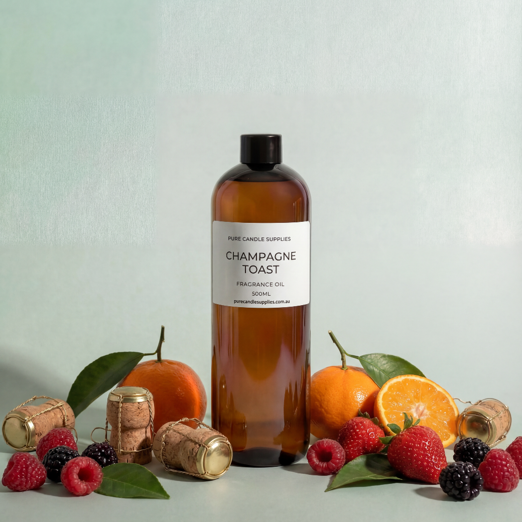 Fragrance bottle reading champagne Toast with citrus, berries and champagne corks surrounding