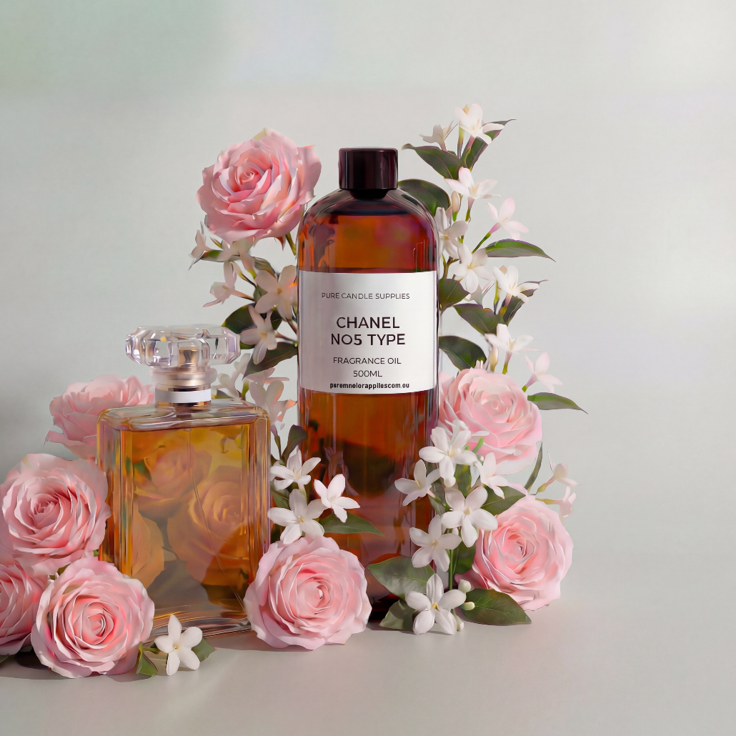 Two perfume bottles with a label on a light gray background with pink flowers.