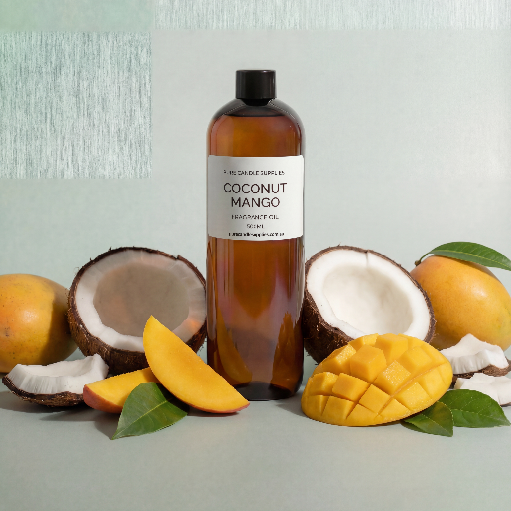 Coconut mango fragrance oil bottle with coconuts and mangoes on a light background