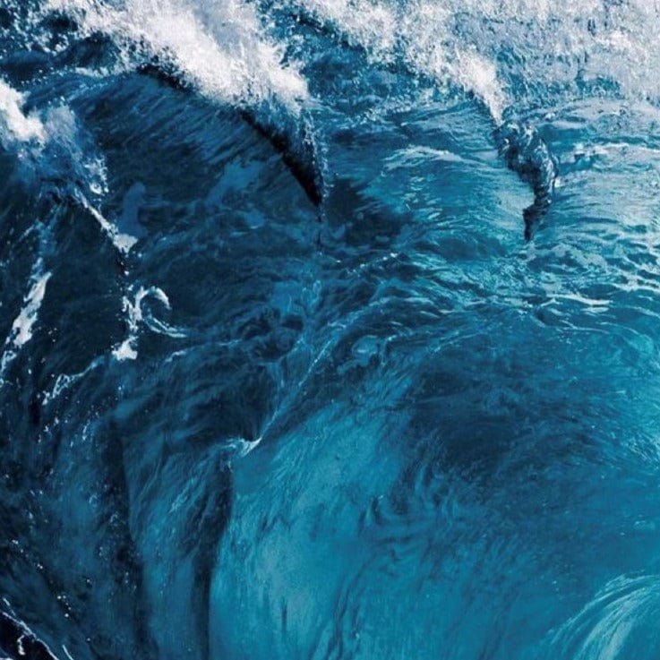 waves in a clear blue ocean