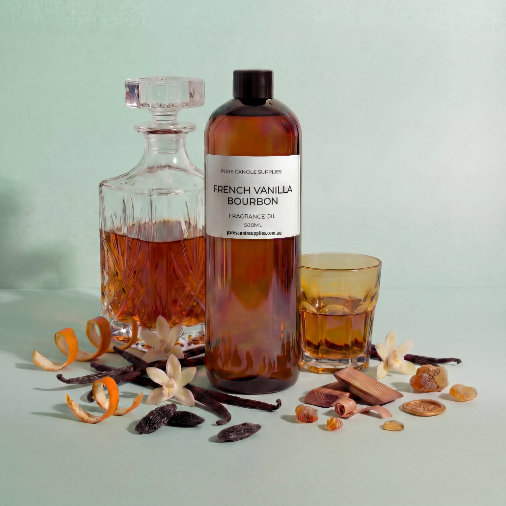 Bottle of French Vanilla Bourbon fragrance oil with a decanter and glass on a light green background