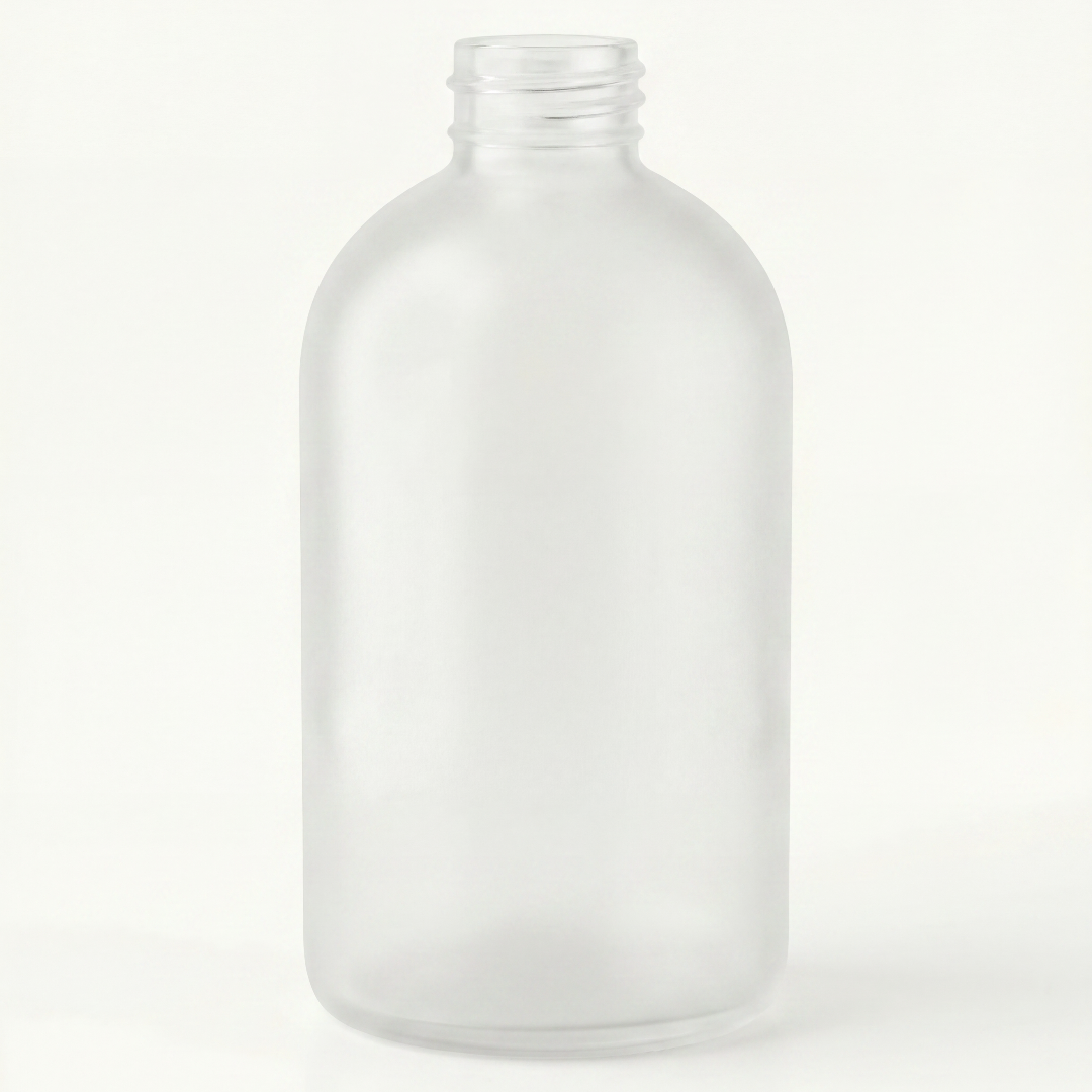 frosted glass diffuser bottle on a white background