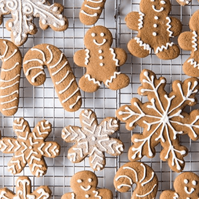 assorted gingerbread cookies on cooling rack