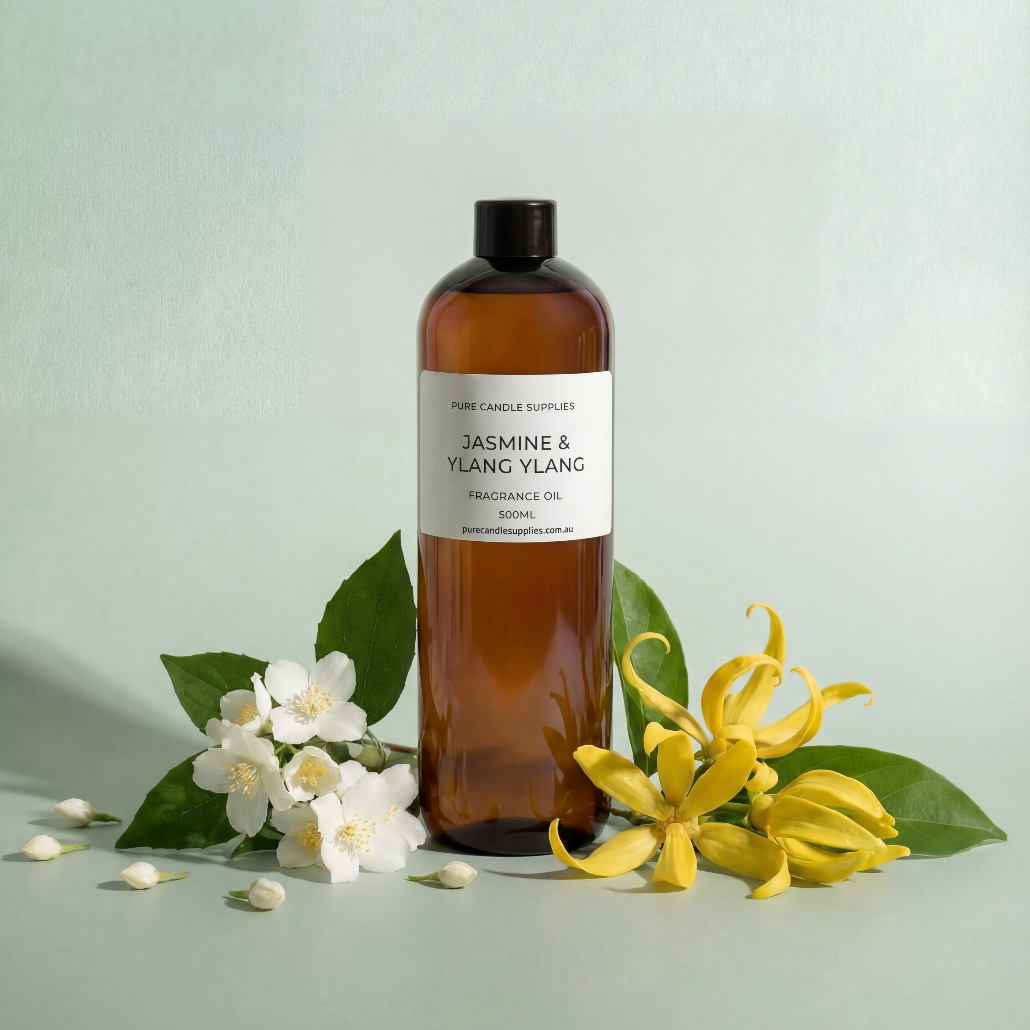 Bottle of Jasmine & Ylang Ylang oil with flowers on a light green background