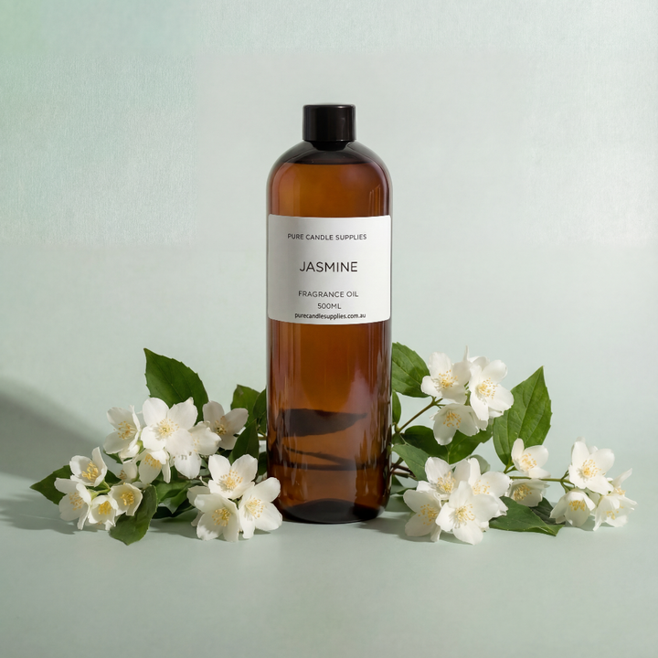 Brown bottle labeled 'Jasmine' with jasmine flowers on a light green background