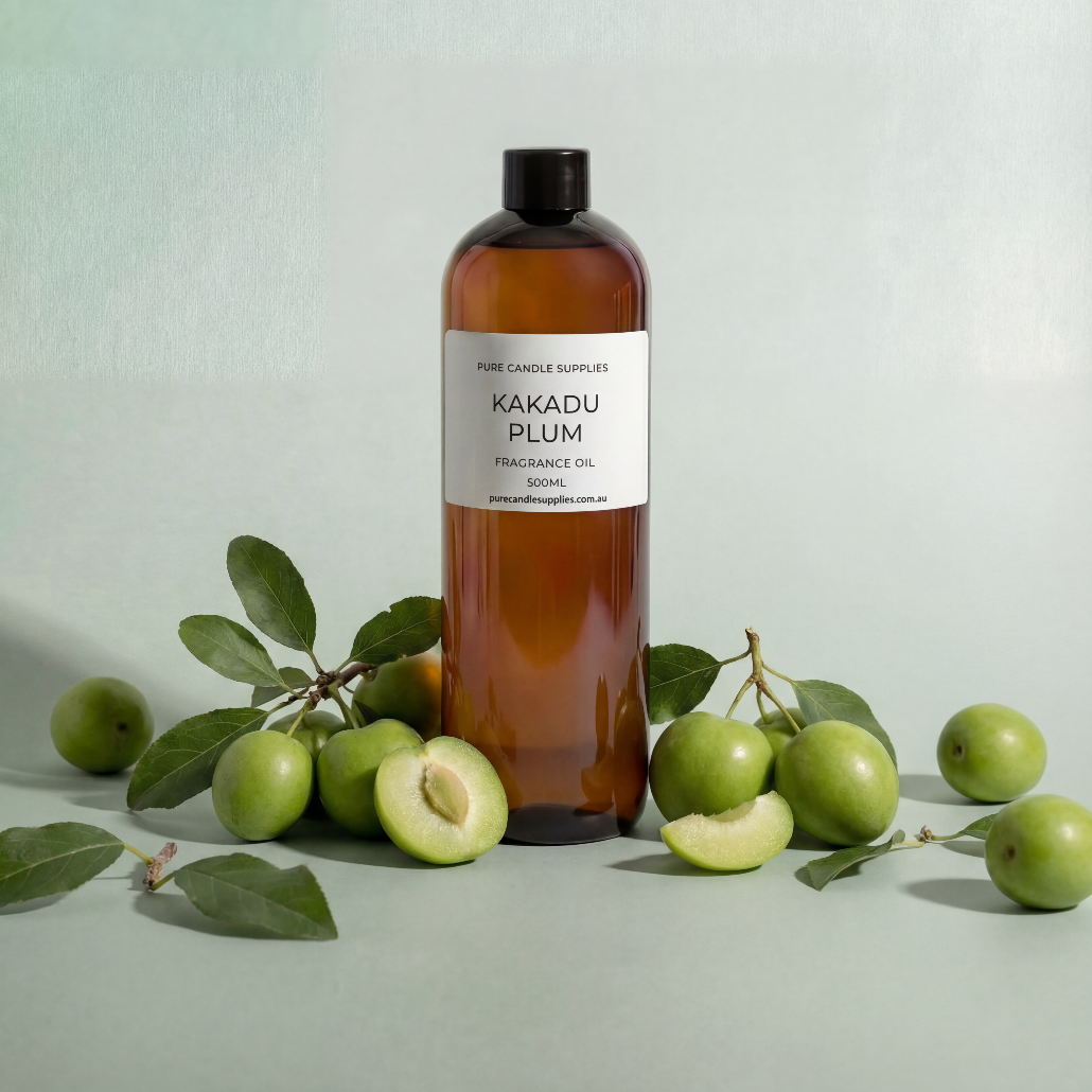 Bottle of Kakadu Plum oil with fruits and leaves on a light green background