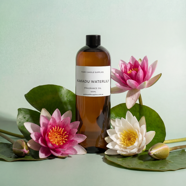 Bottle of Kakadu Waterlily fragrance oil with waterlilies on a light green background