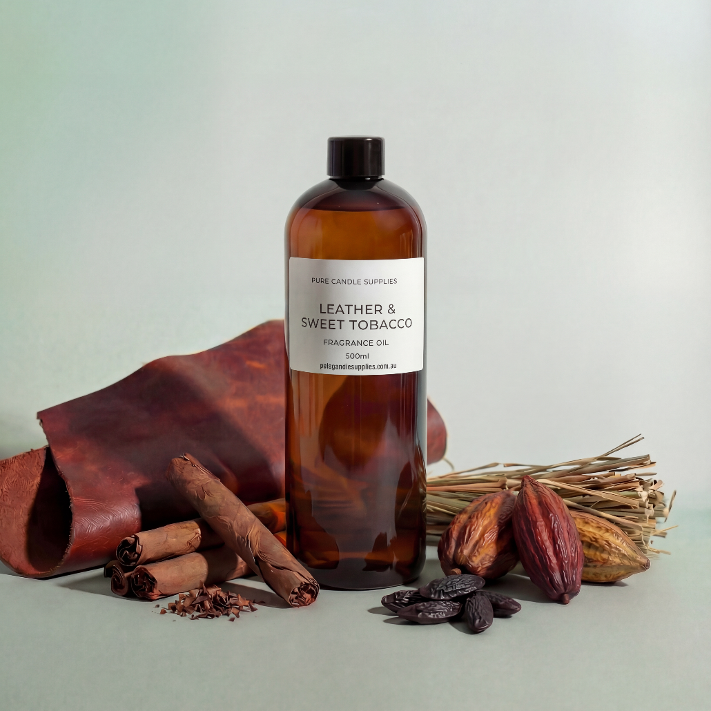 Bottle of leather and sweet tobacco fragrance oil with leather碎片, cinnamon sticks, and dried fruits on a light background