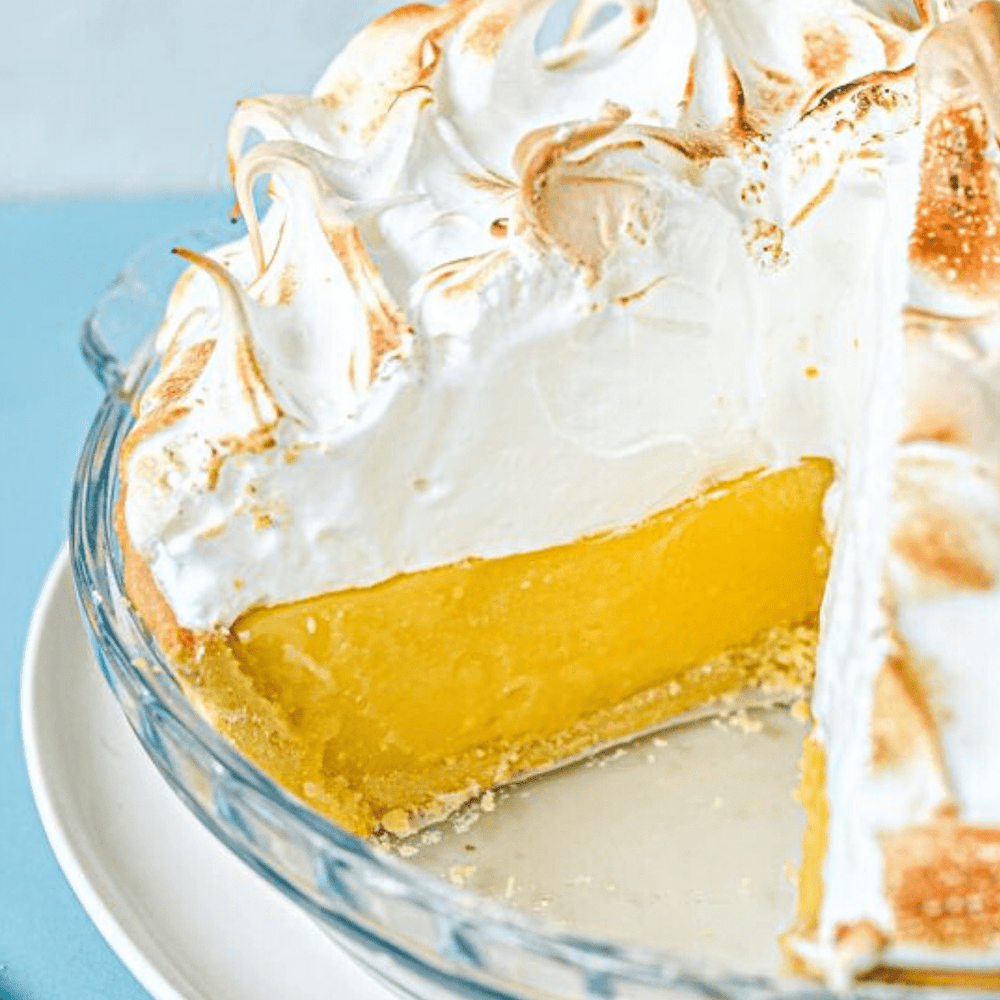 Biscuit base with lemon filling and baked meringue topping