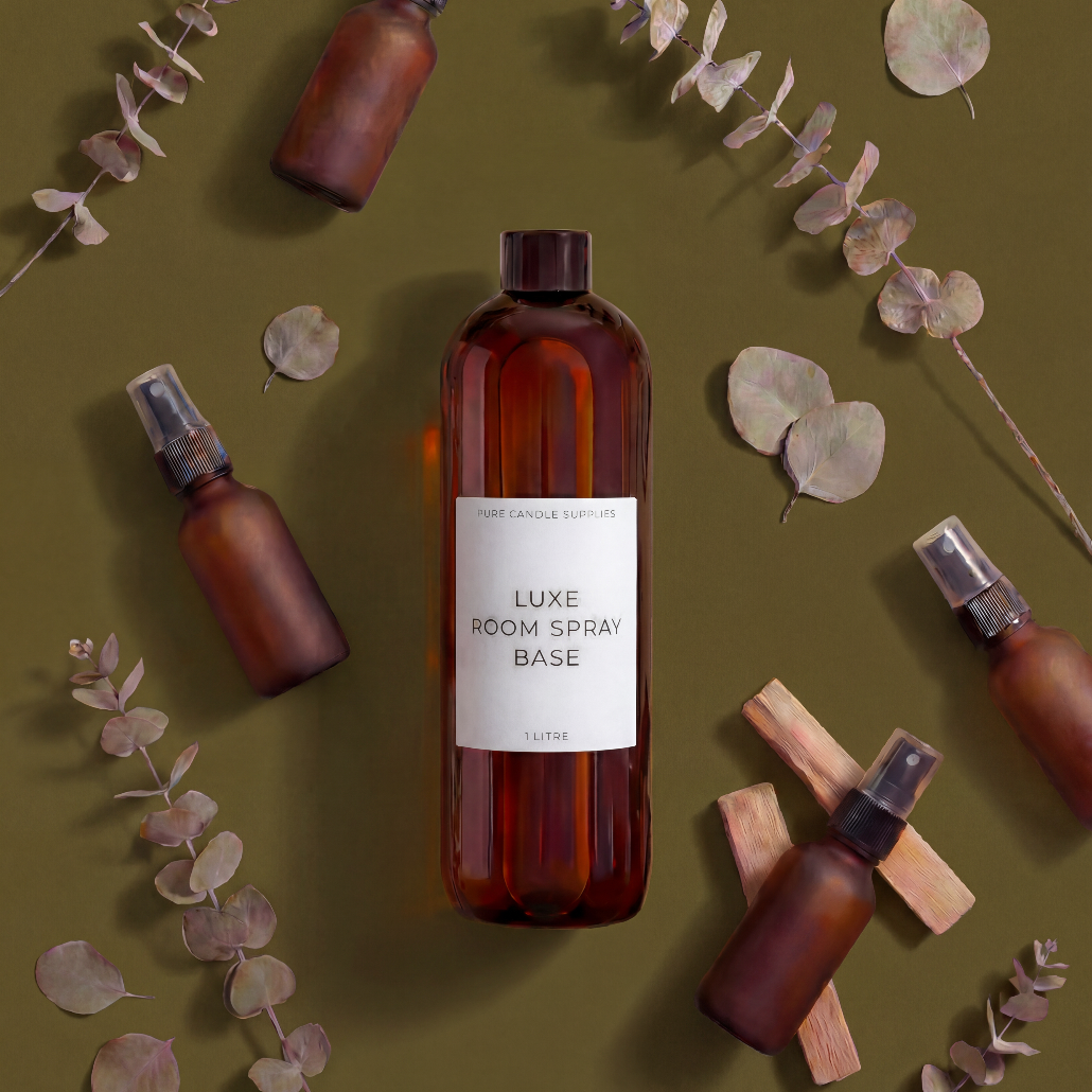 Brown spray bottles with a label on a green background with eucalyptus leaves.