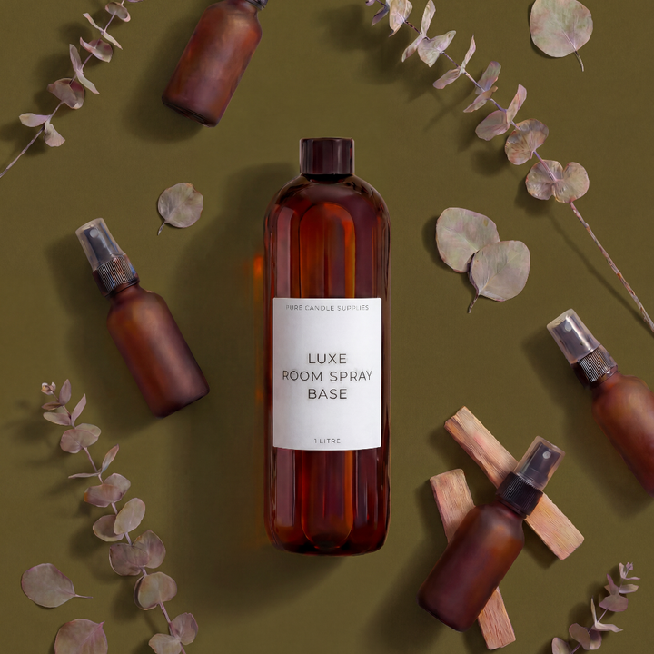 Brown spray bottles with a label on a green background with eucalyptus leaves.