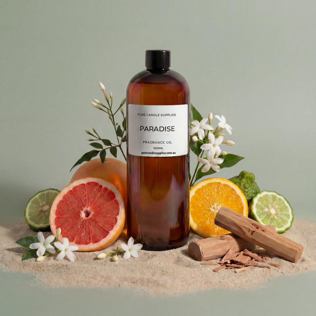 Bottle of Paradise fragrance oil with citrus fruits and cinnamon on a neutral background