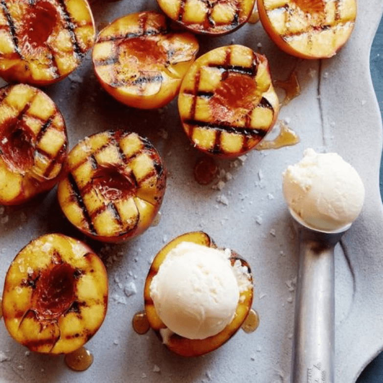 sliced peaches with vanilla ice cream