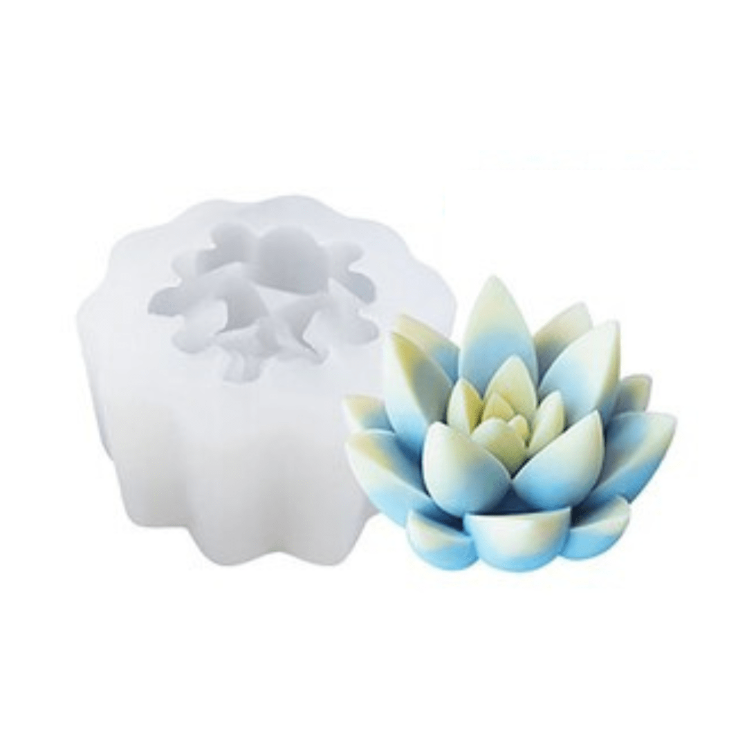 pointed succulent mould candle in blue and yellow wax next to silicone mould on white background
