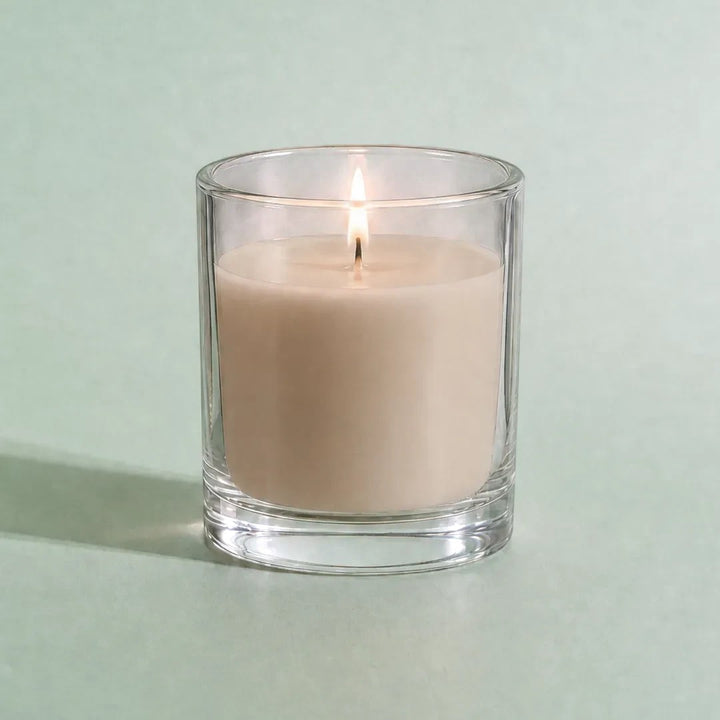 Pure Candle Supplies Melbourne beige candle dye chip result in a glass container with a lit wick