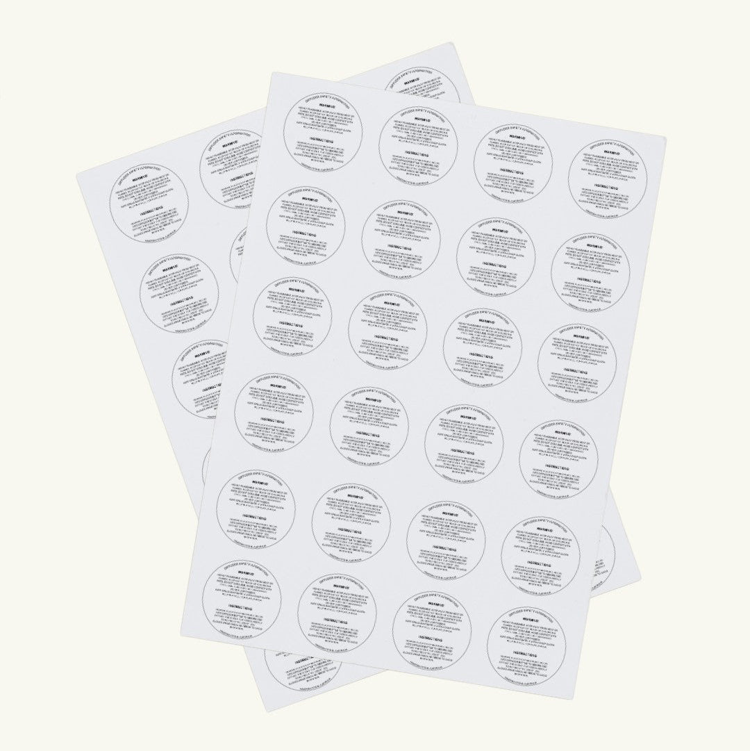 Pure Candle Supplies Melbourne diffuser warning labels on a sheet of 24 circular stickers for glassware safety.